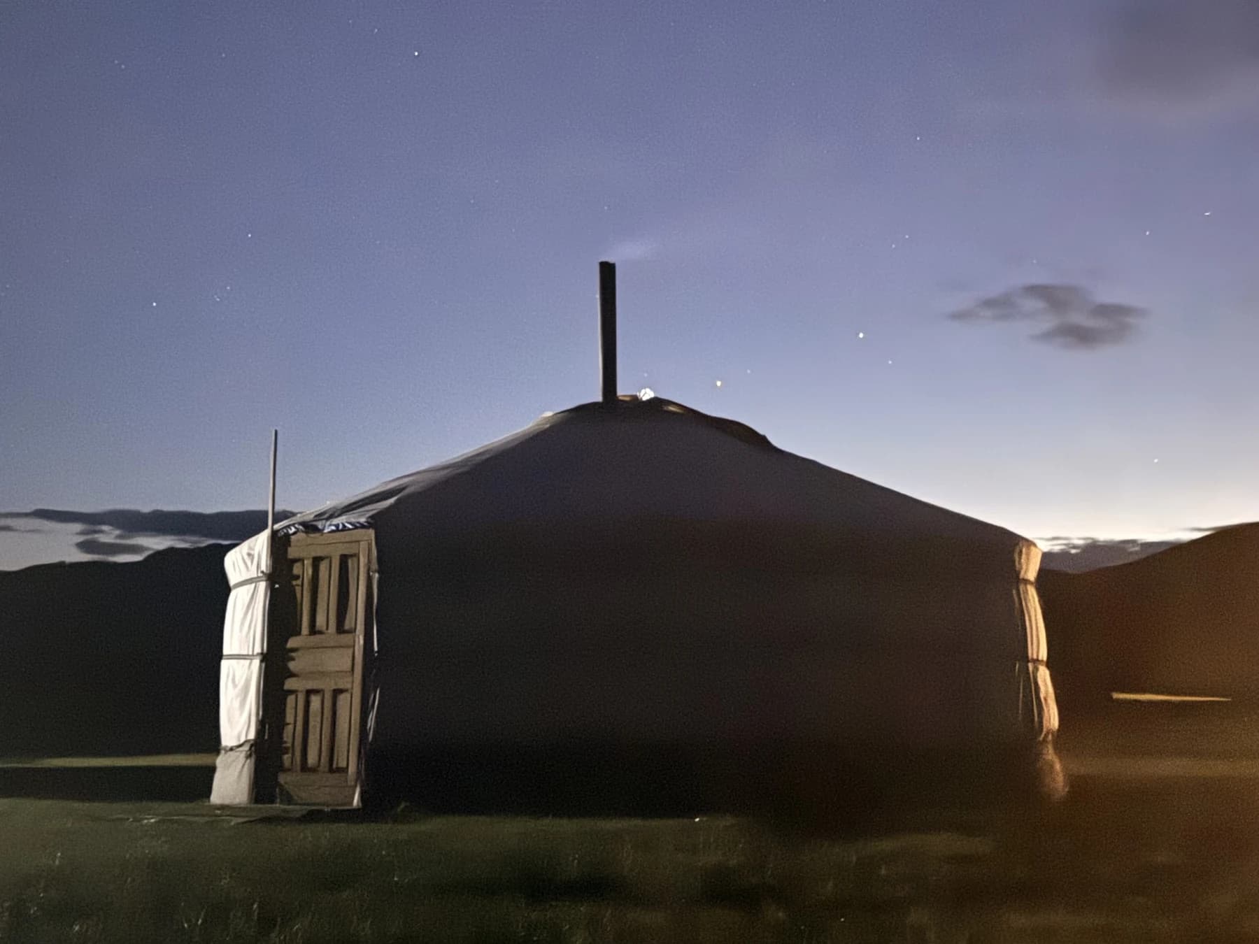 A traditional ger at dusk